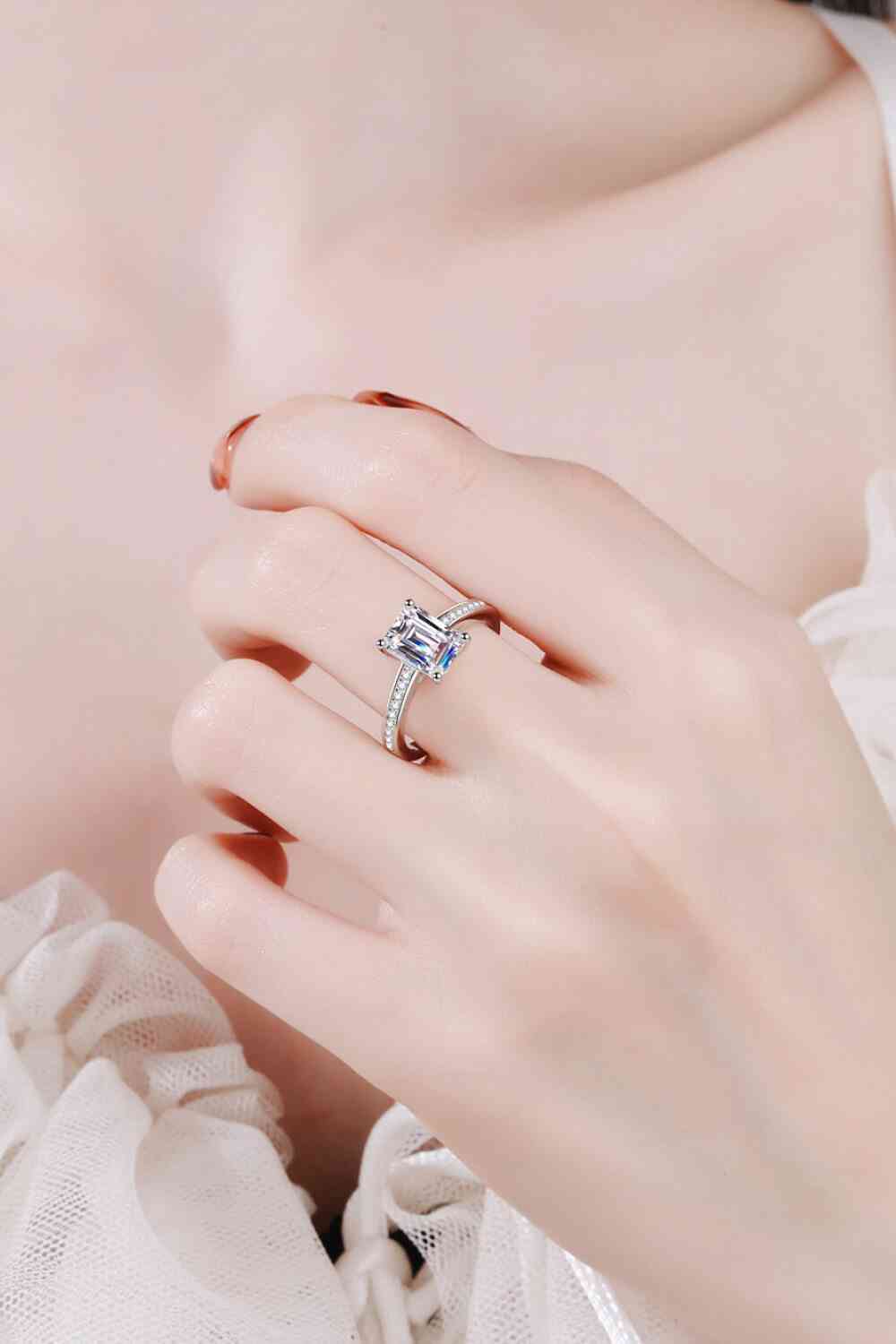 Heavenly Glow Side Stone Moissanite Ring