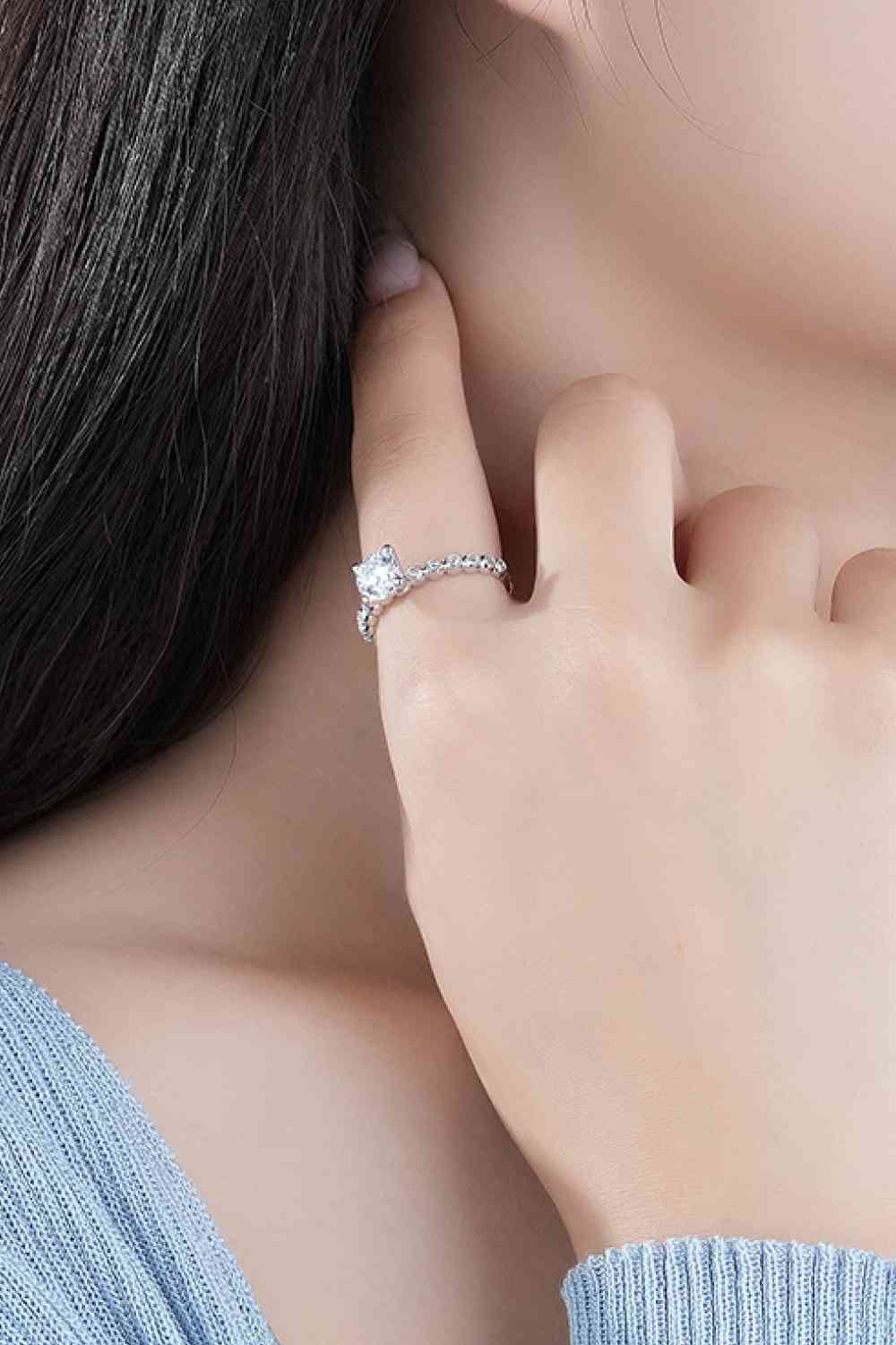 Serene Solitaire Classic 4-Prong Moissanite Ring